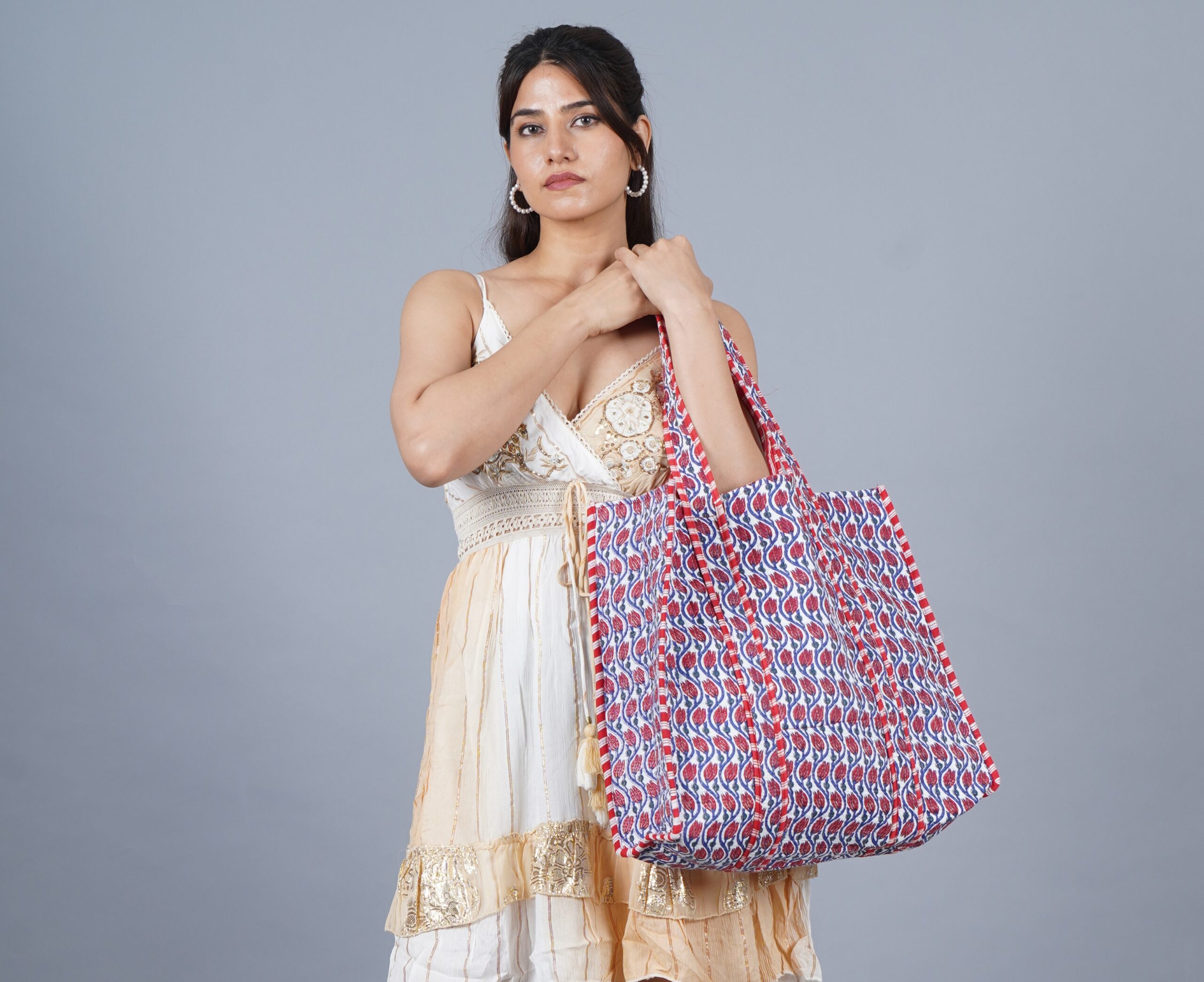 Elevate your accessory game with our Indian Cotton Quilted Handmade Tote Bag, where tradition meets modernity in every stitch